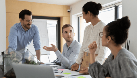 Spiraldot Ventures, coworkers talking in the office